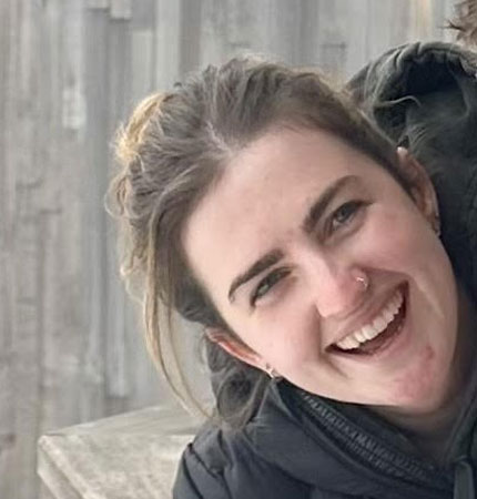 Head photo of a smiling Jaz-Harker