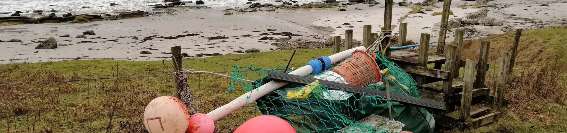 Large plastic items on a Scottish seashore 